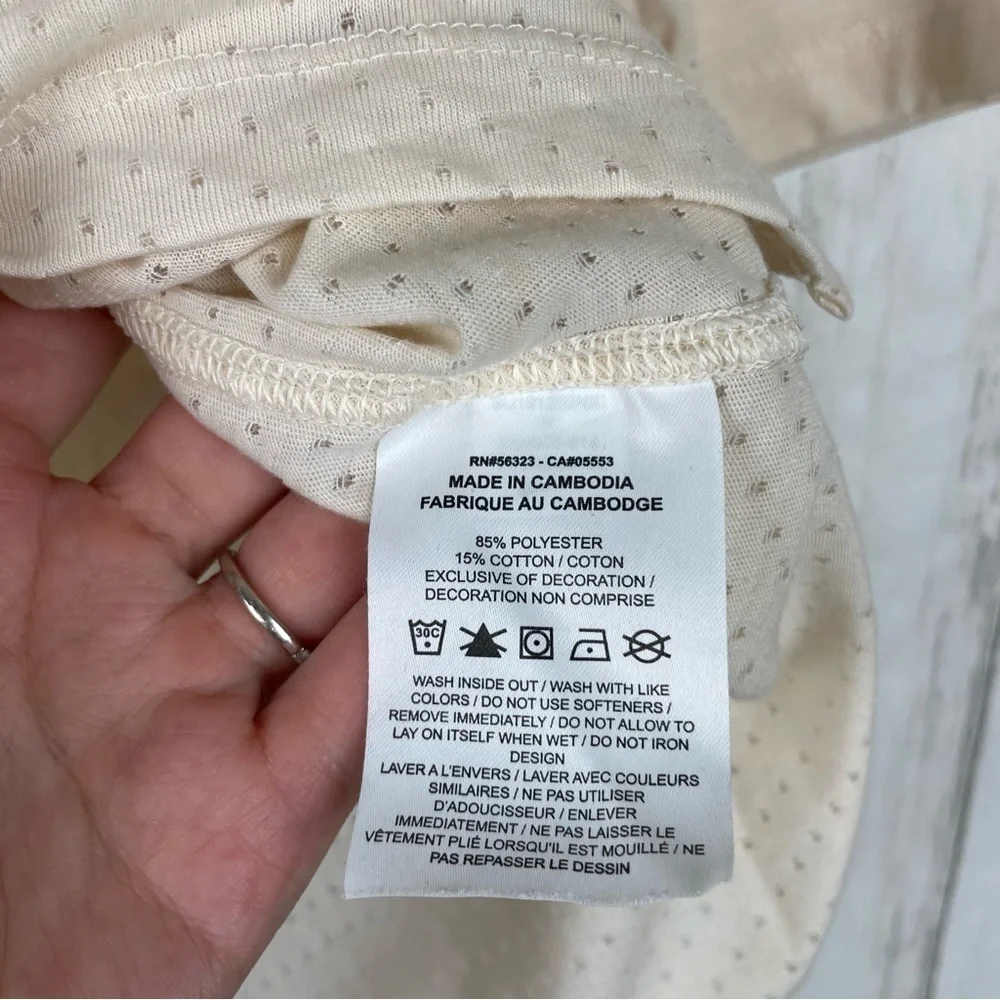 Nike cream medium perforated running crop top